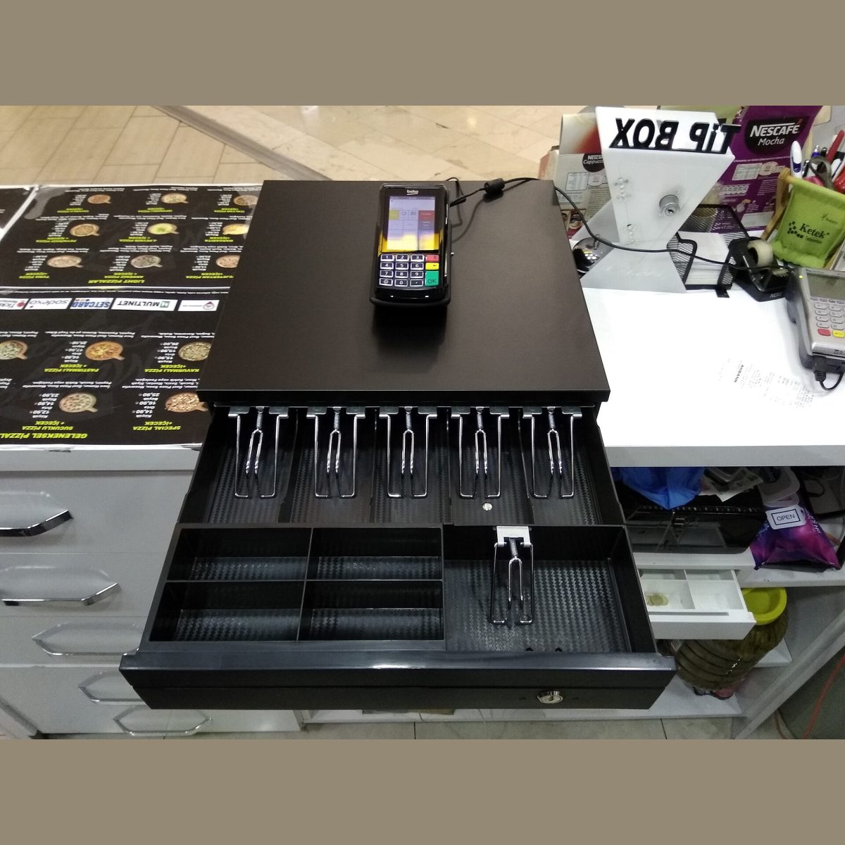 Stock photograph of a cash drawer, standing in for a picture of the 410mm steel cash drawer, 5 note 8 coin