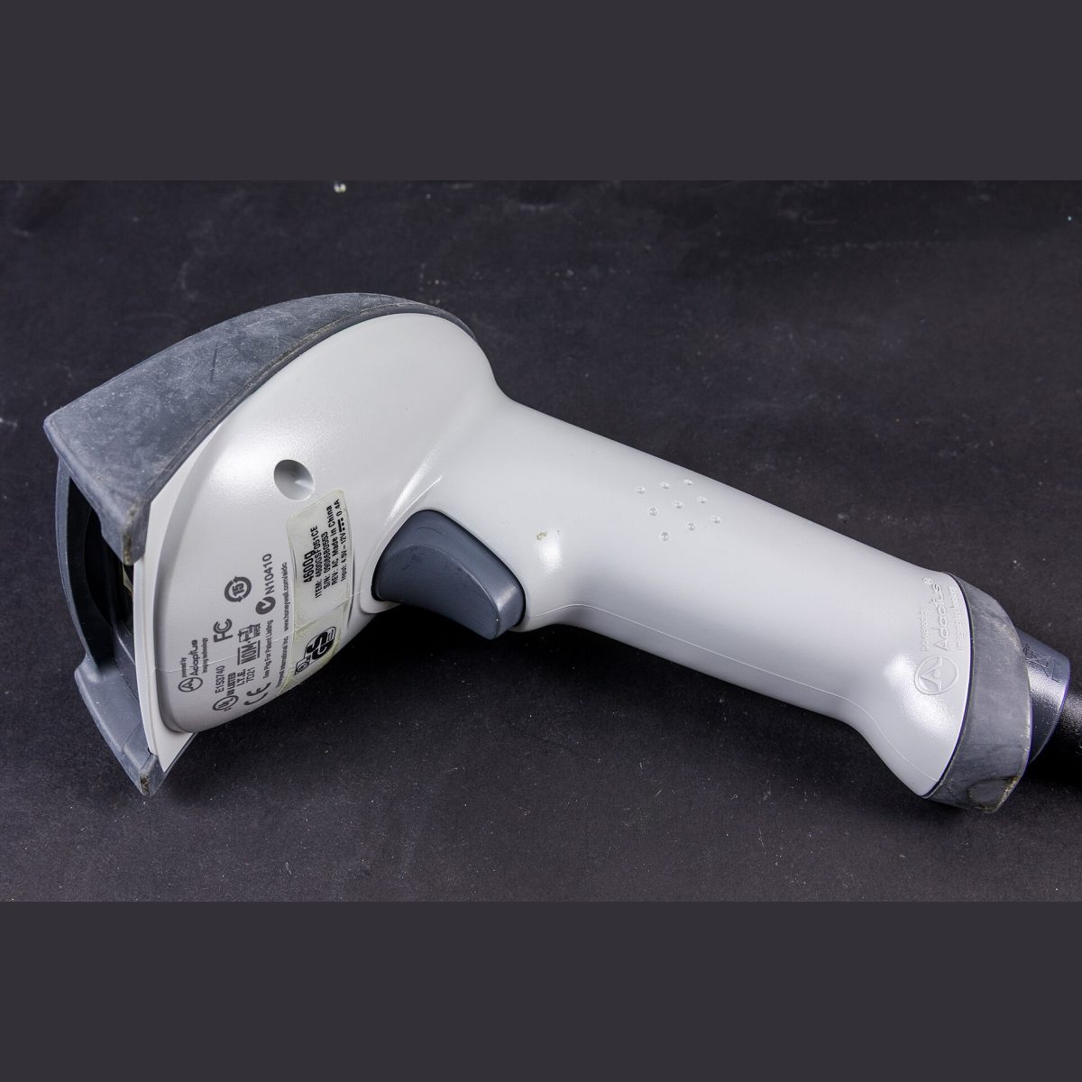 Stock photograph of a handheld barcode scanner, standing in for a picture of the Honeywell Voyager 1250g laser barcode scanner