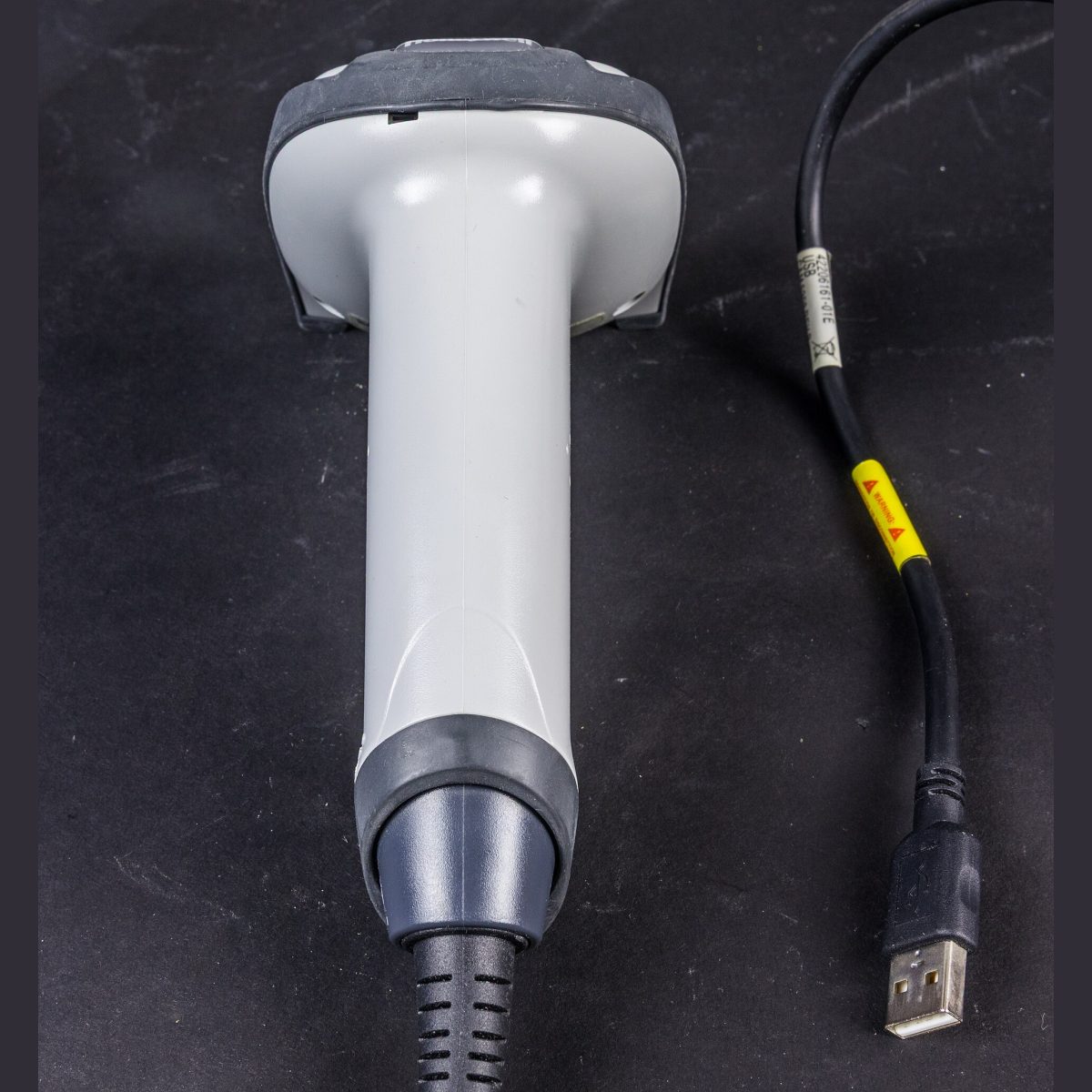 Stock photograph of a handheld barcode scanner, standing in for a picture of the Netum wireless 2D barcode scanner